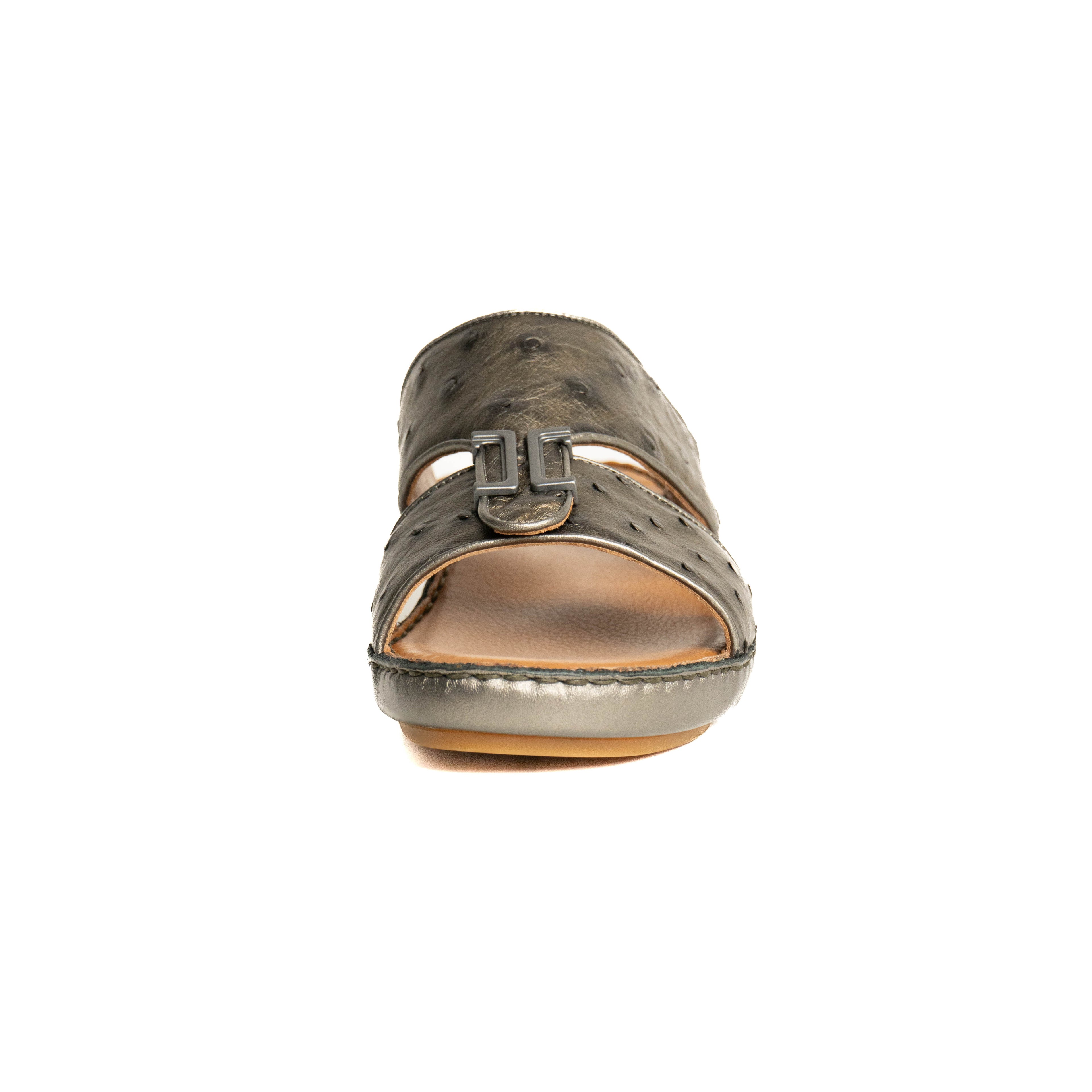 Brown sandal with a buckle on a white background