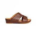 Brown quilted sandal on a white background