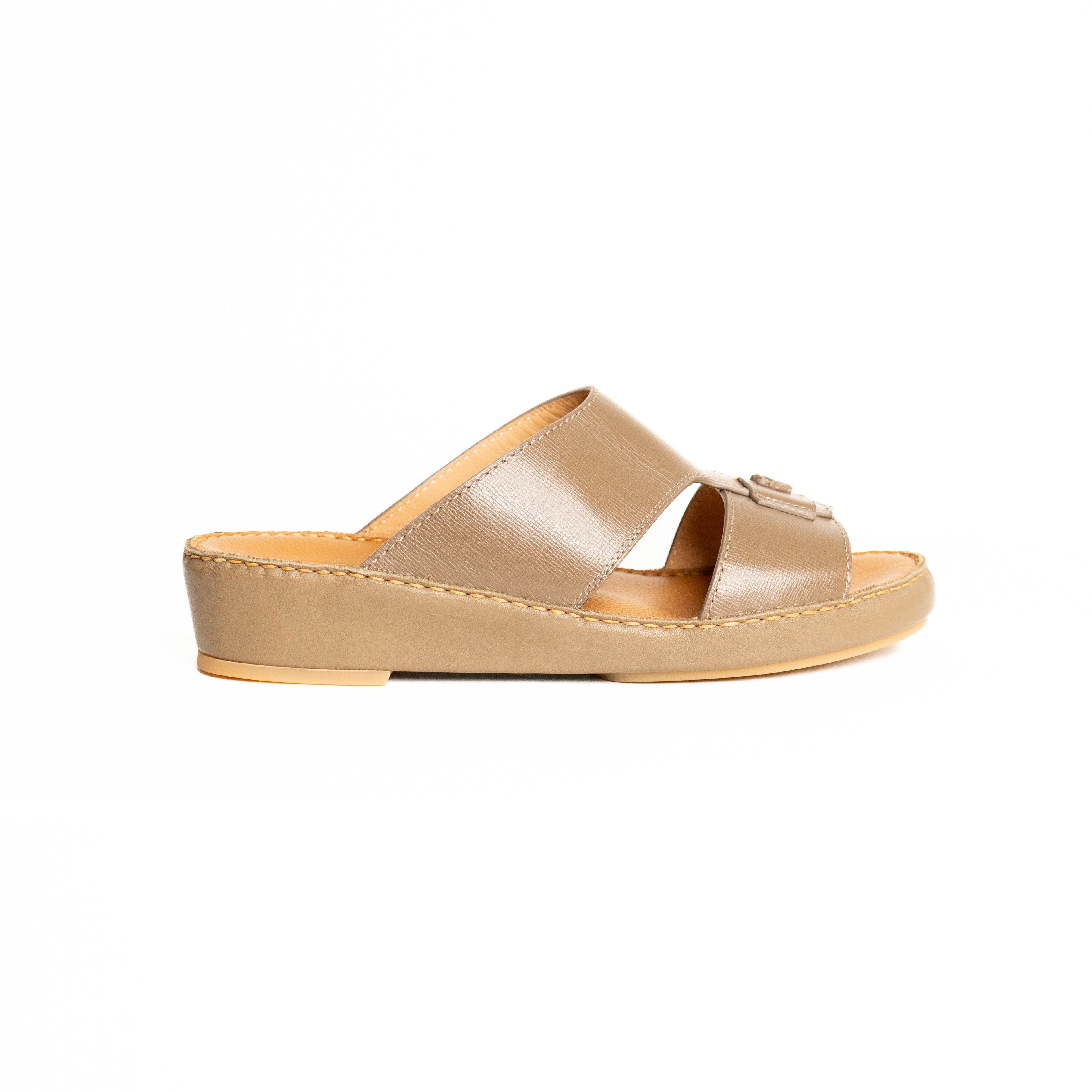 Beige sandal on a white background