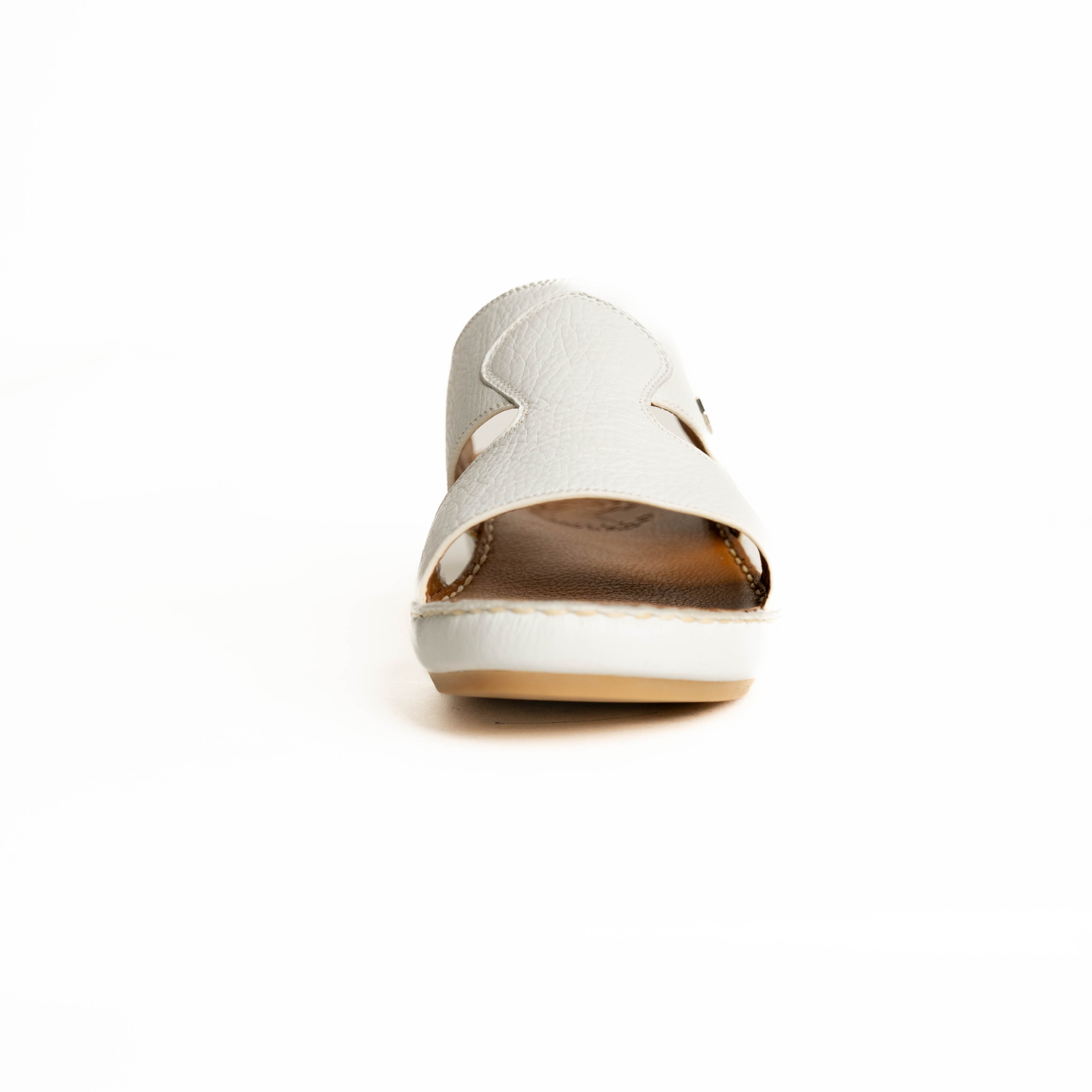 White shoe with brown sole on a white background
