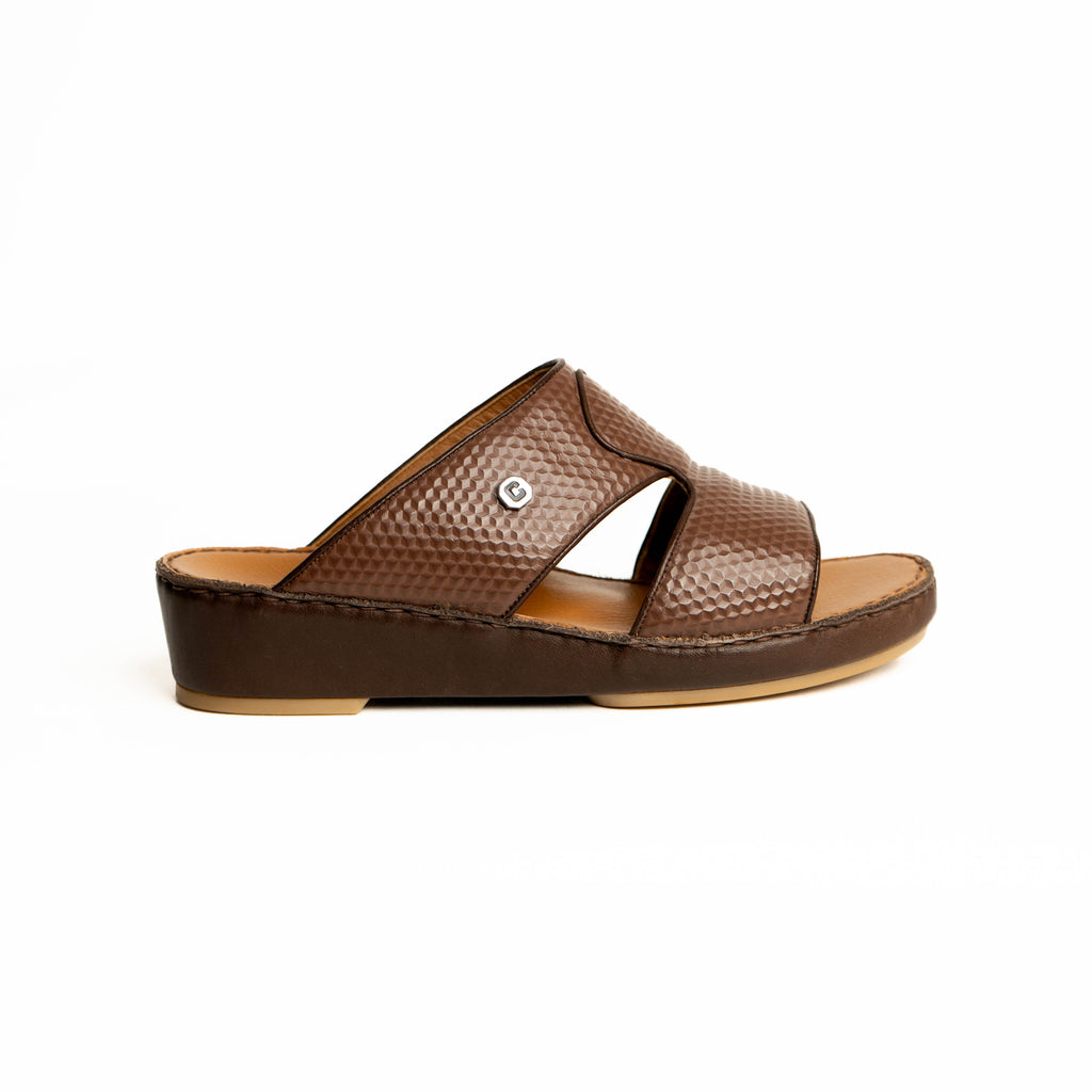 Brown sandal with a white background