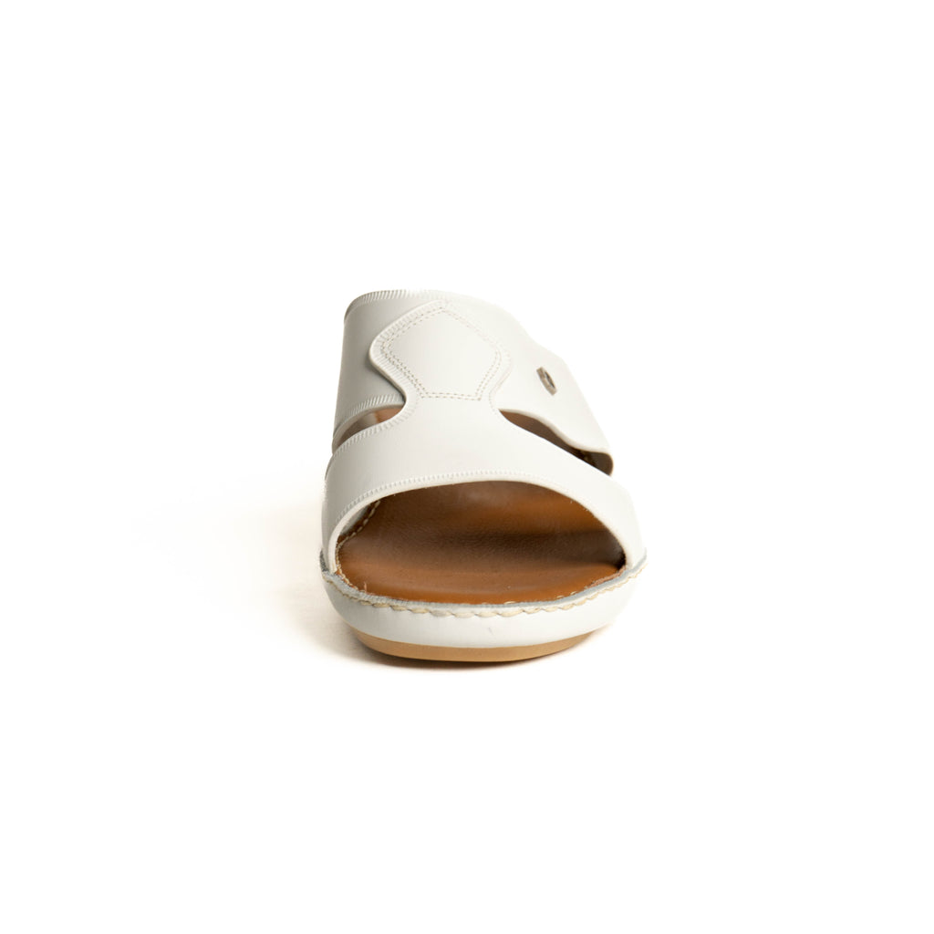 White sandal with a brown sole on a white background