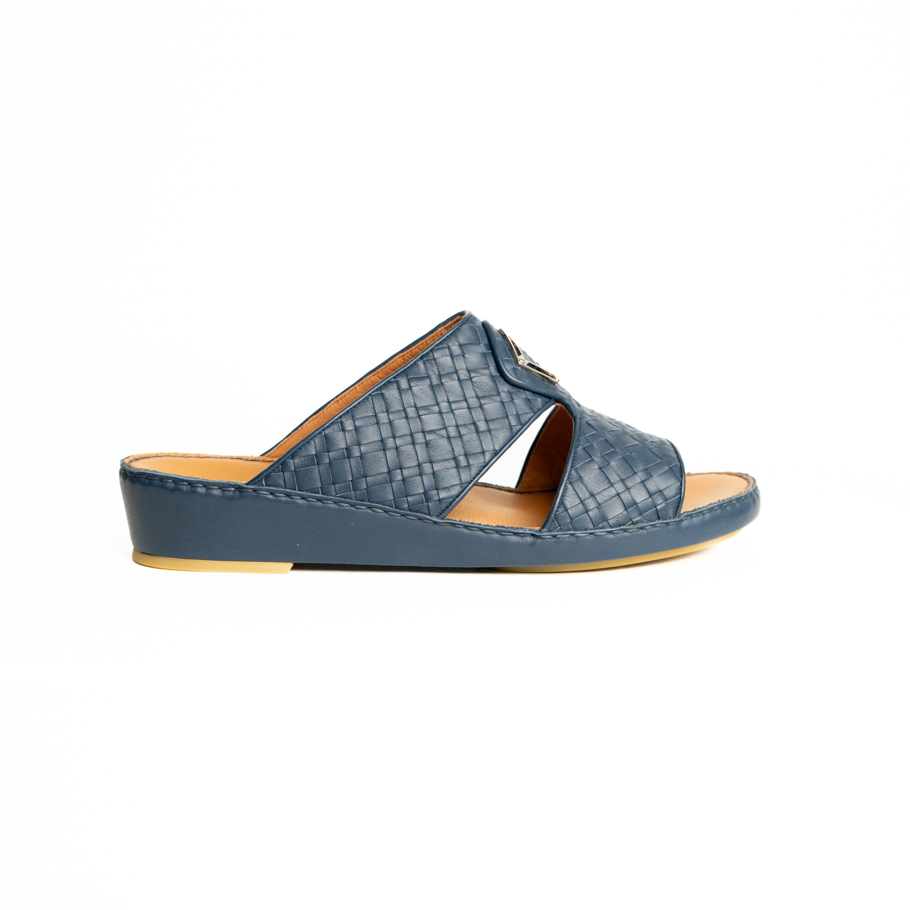 Blue sandal with woven pattern on a white background