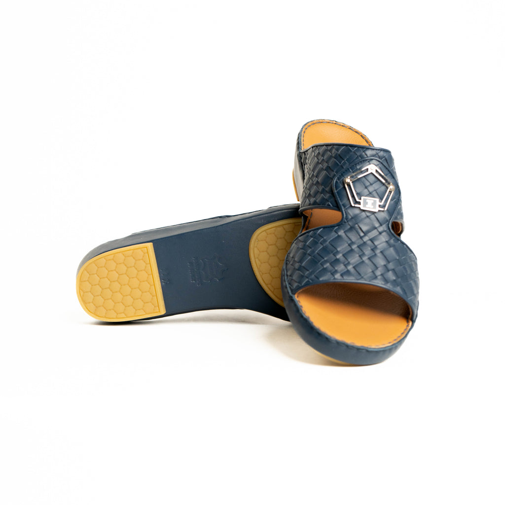 Blue sandal with yellow sole on a white background
