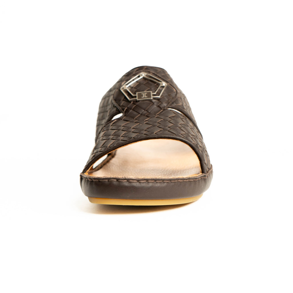 Brown sandal with a woven pattern on a white background
