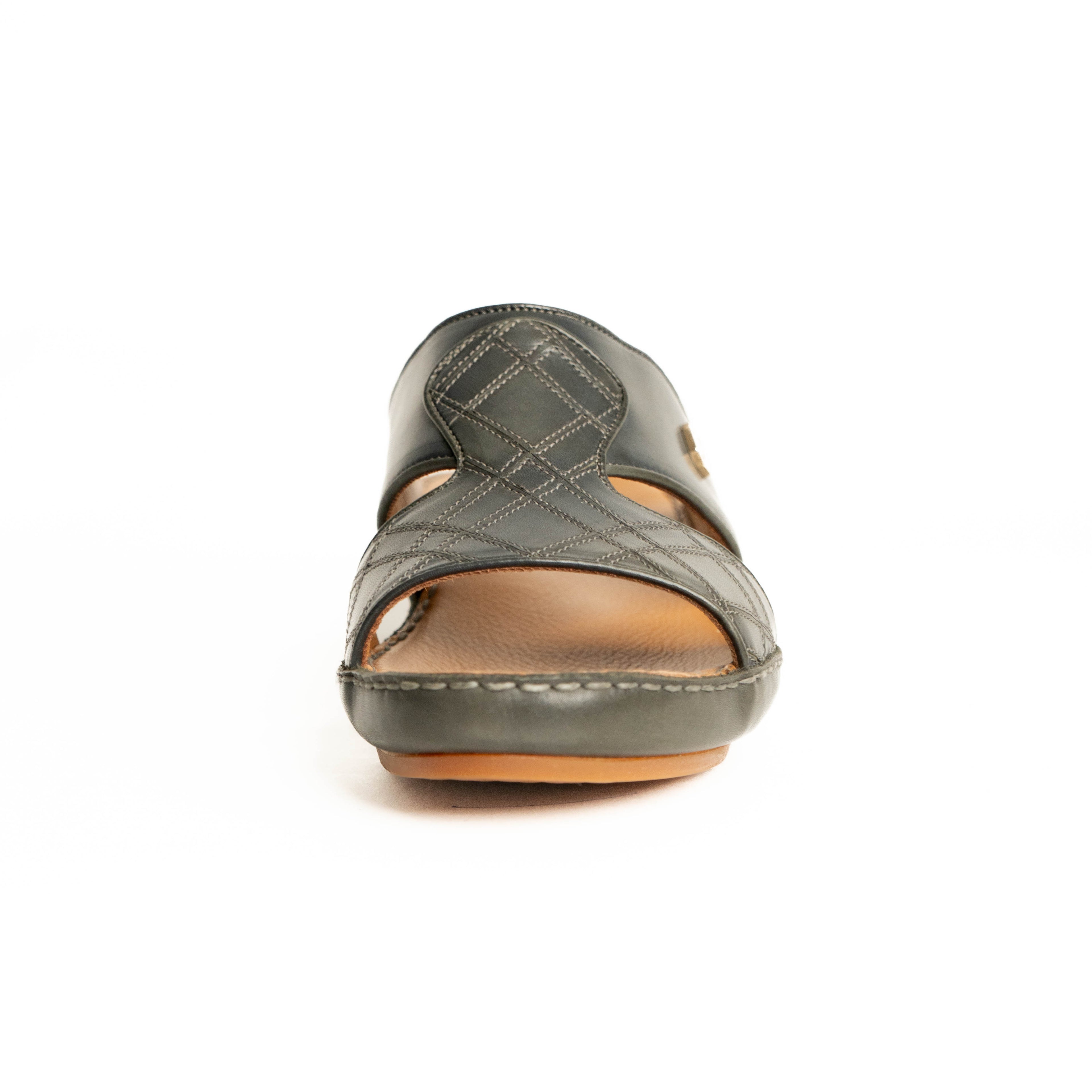 Gray sandal with a brown sole on a white background