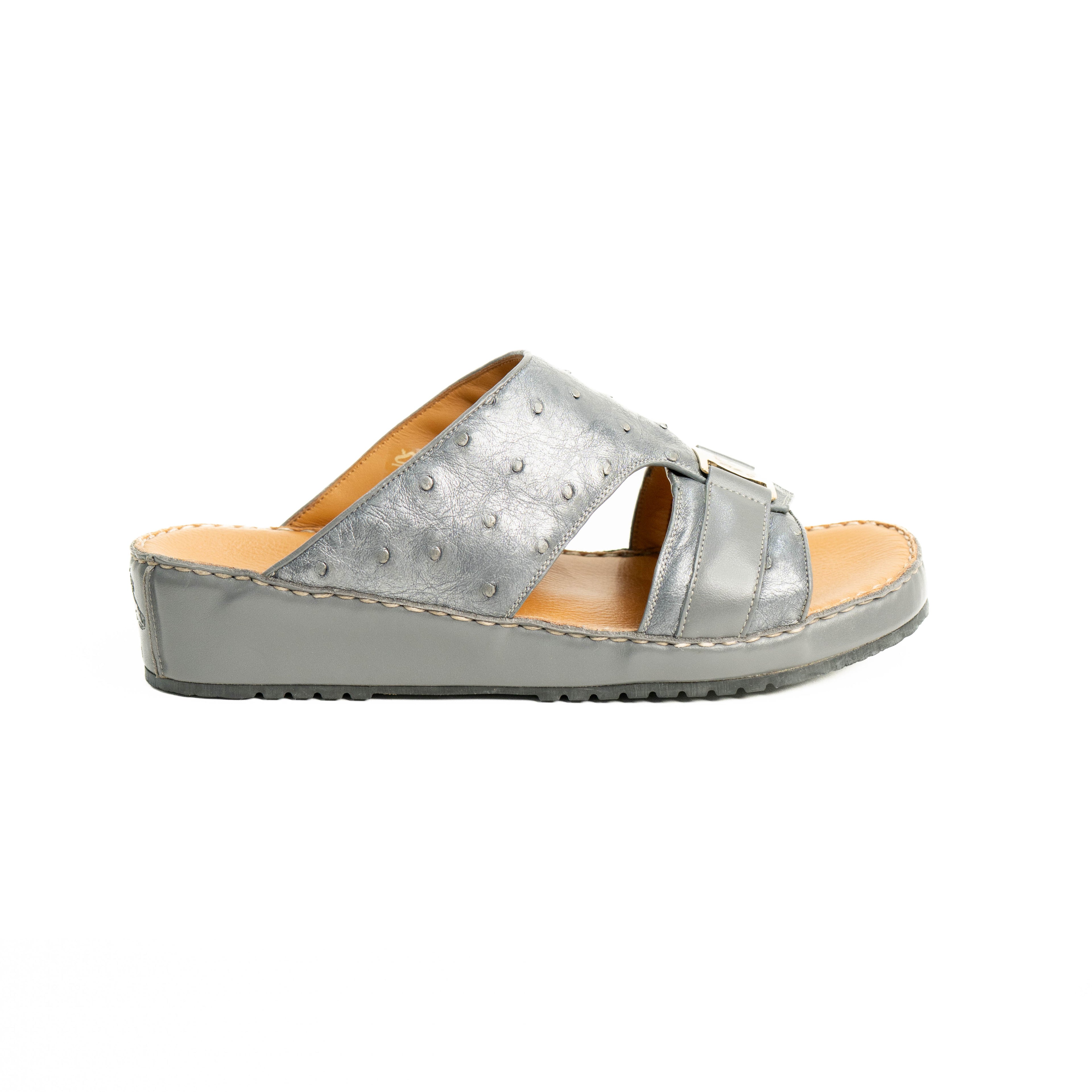 Silver sandal with a wooden sole on a white background